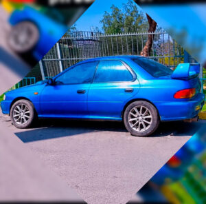 Subaru Impreza azul robado en Lampa, patente RE8300
